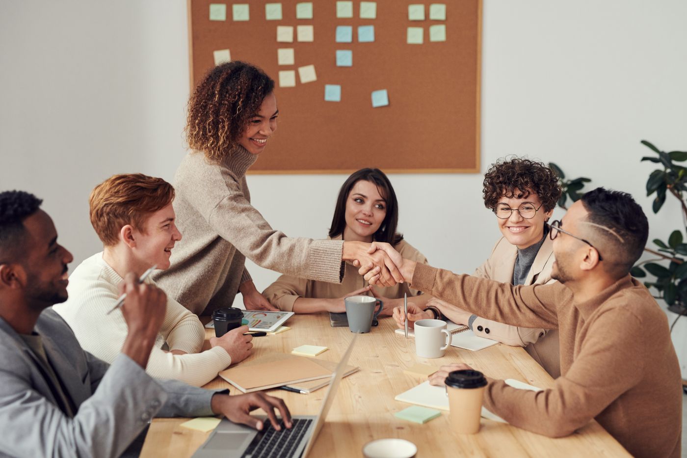 Team working through a problem together around a table