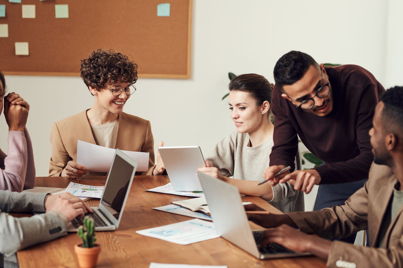 People working through a project together around a table