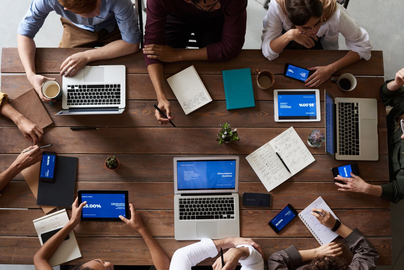 Team connecting tools and platforms around a shared workspace